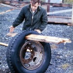 A plank driven through a tire by the tsunami in Whittier