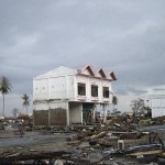 A two-story house damaged by the tsunami showing the tsunami inundation height in downtown Banda Aceh.